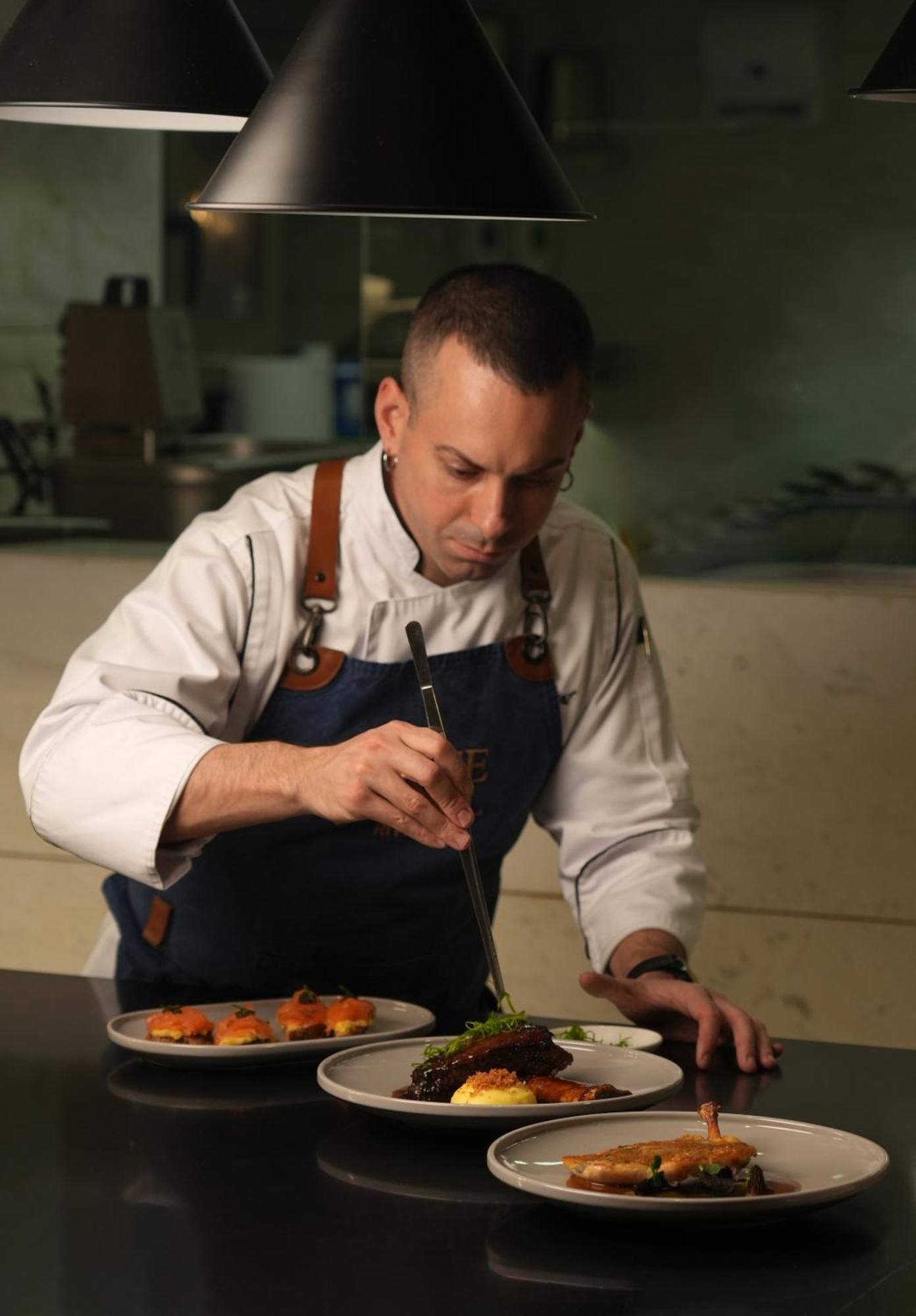 Fairmont Riyadh Exterior photo Chef preparing a dish