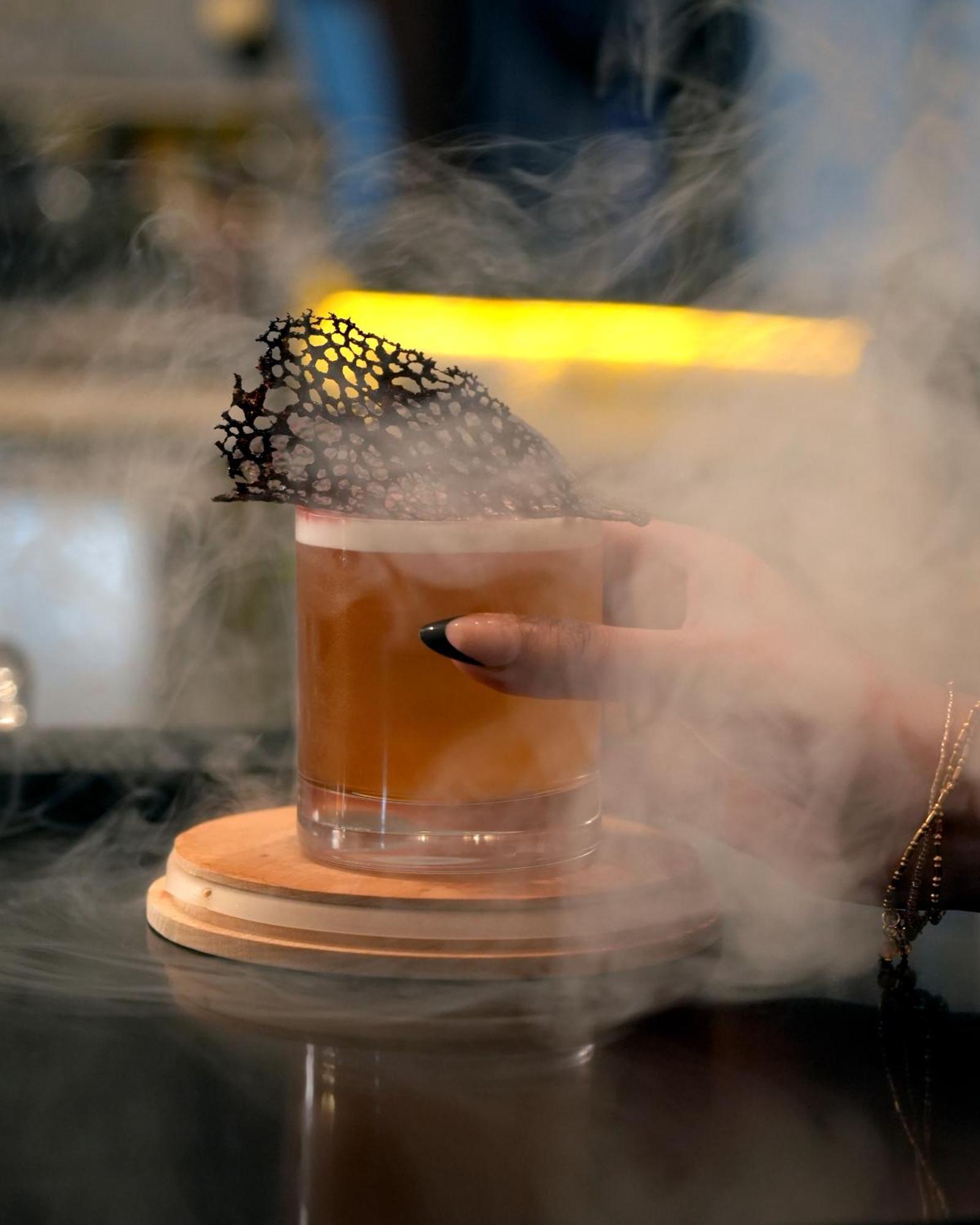 Fairmont Riyadh Exterior photo A smoked Old Fashioned